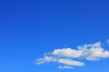 Blue Sky Background and Clouds. Simple Natural Texture Template of Blue Sky with Clouds. Outdoor...