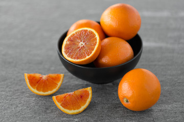 food, fruits and healthy eating concept -close up of fresh juicy blood oranges