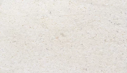 Tuinposter Gedetailleerde marmeren steen. Fragment van kalksteenmuur, steenblokachtergrond. © Gray wall studio