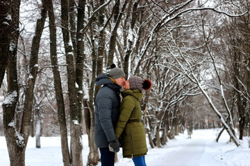 Fototapeta na wymiar couple heterosexual street walk winter