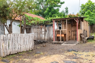 Sao Tome, wooden huts in the tropical forest
