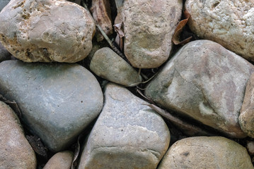 Small and large stones are arranged in various shapes,Concept idea whether small or large, all parts can live together.