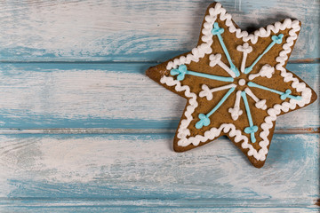 Gingerbread Star on Old Wooden Table