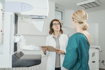 Doctor and Patient on Mammography Examination