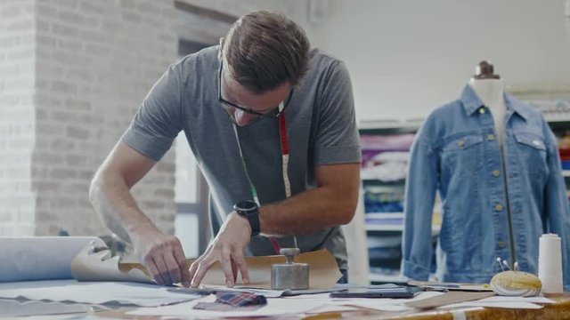 Fashion designer working in his studio