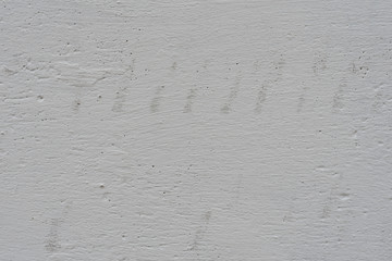Wall fragment with scratches and cracks. It can be used as a background