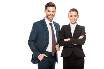 successful young business partners in stylish suits looking at camera isolated on white