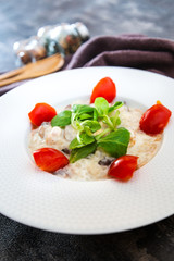 risotto with fresh cream, salted chicken, rehydrated ceps and mushrooms
