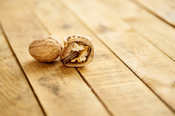 delicious and fresh crushed walnuts on an old wooden table