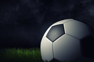 3d rendering of a single football ball on a dark grass field under bright spotlight.