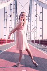 I am ready. Nice attractive woman standing in the dancing position while preparing to dance © Viacheslav Yakobchuk