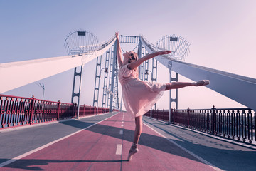 To the sky. Joyful happy woman holding her head up while enjoying her dance © Viacheslav Yakobchuk