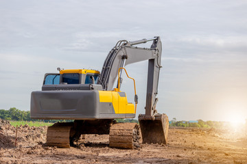Fototapeta na wymiar Backhoes Excavator machine at a Construction Site