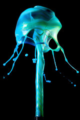 abstract background, blue paint jellyfish fountain, splash of colourful water, liquid art, creative idea