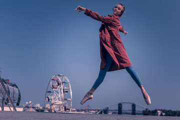 Beautiful dance. Positive young woman doing graceful movements while being a professional dancer © Viacheslav Yakobchuk