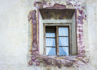 Fototapeta na wymiar Glorenza in South Tyrol/Trentino Alto Adige, Italy. characteristic window of the small historical town