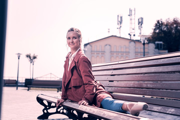 Professional skills. Nice young woman doing splits in the park while showing her professional skills © Viacheslav Yakobchuk