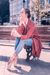 Difficult decision. Pleasant thoughtful woman thinking about a hamburger while feeling very hungry © Viacheslav Yakobchuk