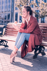 Strict diet. Nice attractive woman looking at the hamburger while feeling hungry © Viacheslav Yakobchuk