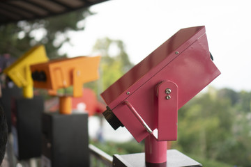 Sightseeing Binoculars Overlooking top view of Georgetown, Penang Island, Malaysia