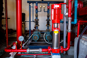 Jockey pump fire pump, Industrial fire extinguishing system with control system red piping and...