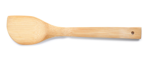 Kitchen utensil made of bamboo on white background, top view
