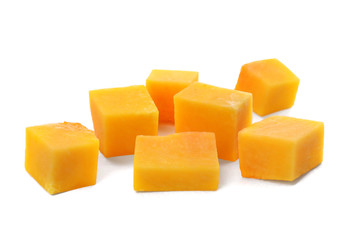 Fresh raw pumpkin pieces isolated on white