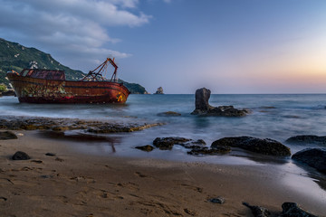 Fototapeta na wymiar Blackrocks corfu island - shipwreck and sunset feel