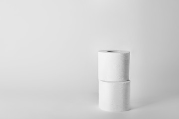 Rolls of toilet paper on white background. Space for text