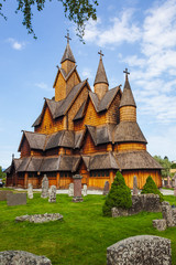 Fototapeta na wymiar Medieval Heddal Stave Church and old rural churchyard near, Notodden, Norway