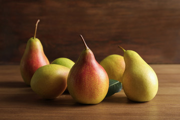 Ripe pears on wooden table. Healthy snack