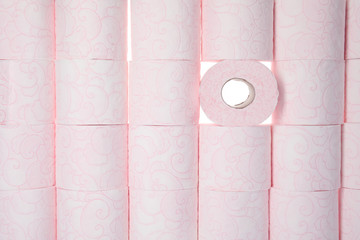 Many rolls of toilet paper as background, top view