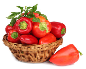 Sweet pepper in a basket isolated on a white background