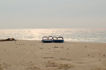 Holiday on beach concept alone Sandals
