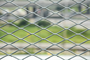 Fototapeta premium closeup dirty metal net background