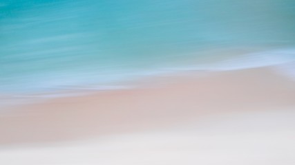 Fototapeta na wymiar Motion blurred background of Nature scene beach and blue sky