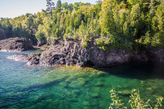 Lake Superior Cliffs. Cliffs in the Marquette Presque Isle city park is a popular cliff diving location in the Upper Peninsula of Michigan.