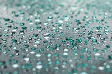 water drops on a blue surface