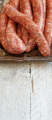 Raw Sausages on a metal tray
