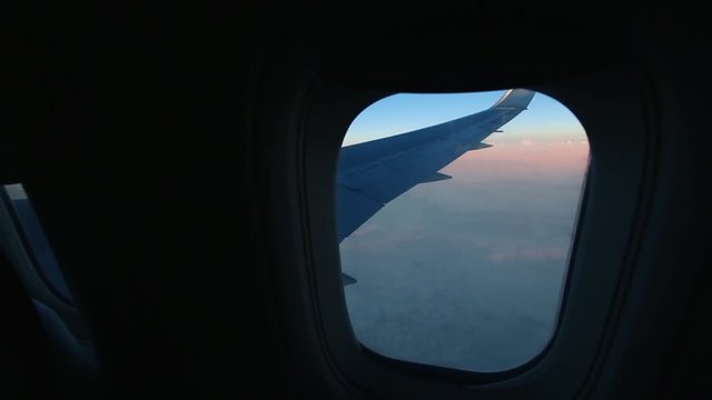 Airplane Window View at Sunset