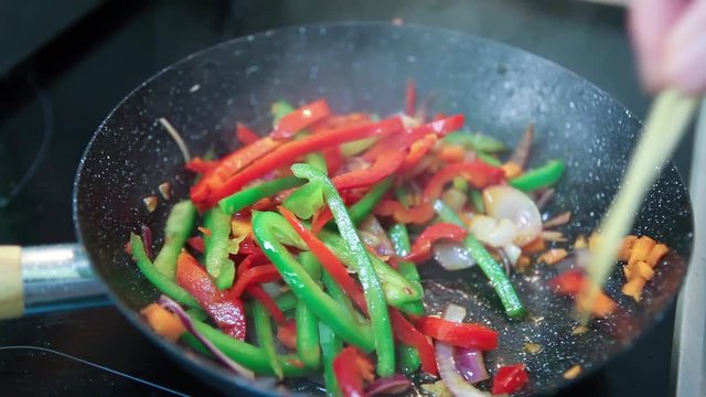 Preparing vegetables and chicken wok