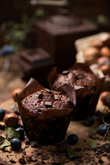 Muffins on wooden table