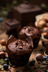 Muffins on wooden table