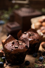 Muffins on wooden table