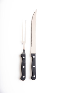 isolated carving knife and fork