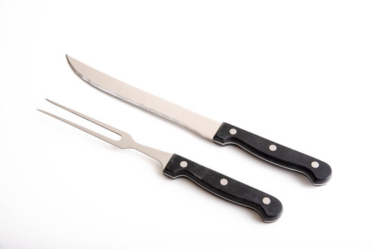 isolated carving knife and fork