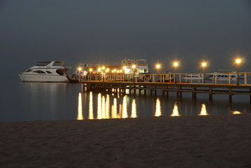 Diver Marina Boat in Egypt Read Sea divers in the evening from the beach