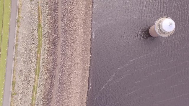 Llyn Celyn, aerial shot looking downward on the reservoir bank in drought 2018.m