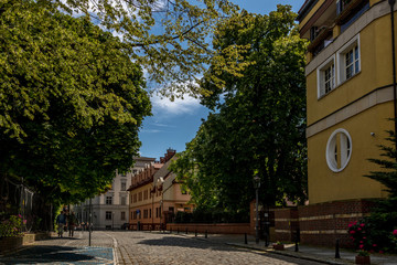 Wrocław side stree with path and trees