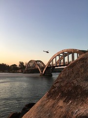 Helicopter above a brigde